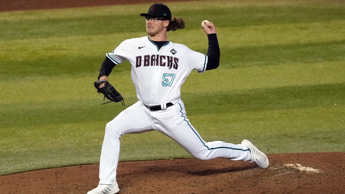 Arizona Diamondbacks left-handed pitcher Andrew Saalfrank (57) pitches in Game 3 of the 2023 World Series at Chase Field.