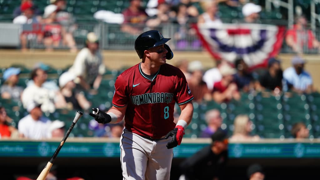 Arizona Diamondbacks catcher James McCann (8) hits a three-run home run against the Minnesota Twins at Target Field.