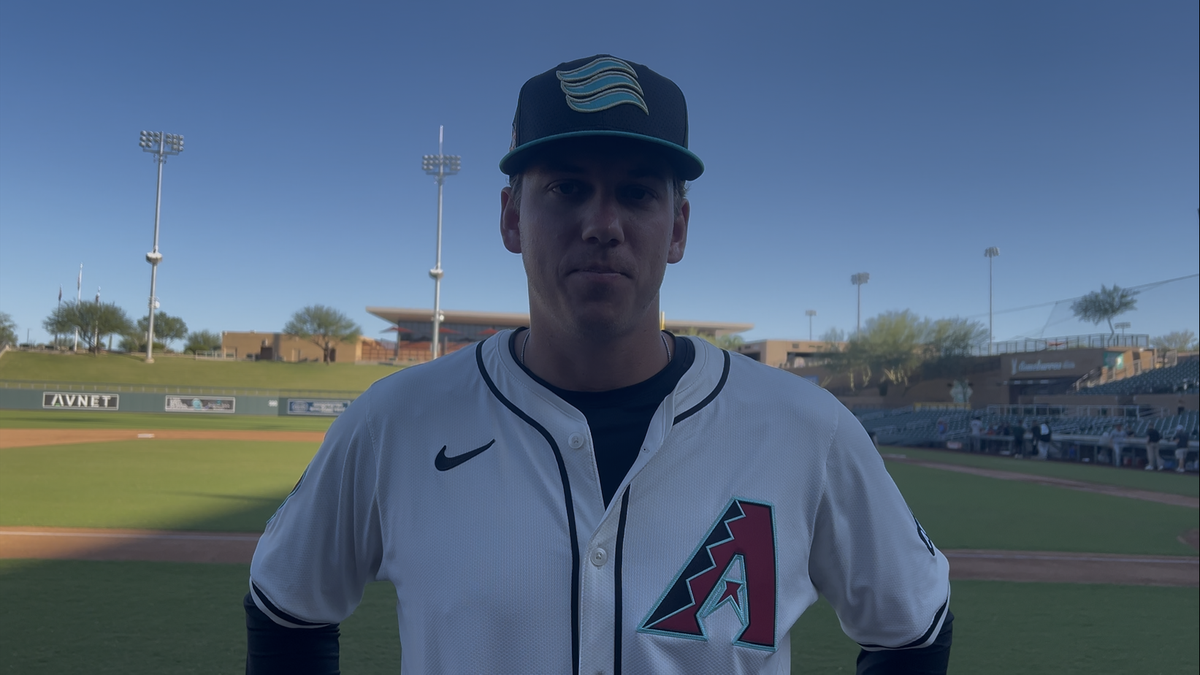 Arizona Diamondbacks Complex League Coach Dylan Olsonawski (18) talks to Michael McDermott from D-backs Under Review at Salt River Fields during the Arizona Fall League.