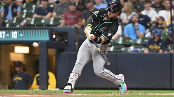 Arizona Diamondbacks catcher José Herrera (11) homers against the Milwaukee Brewers at American Family Field.